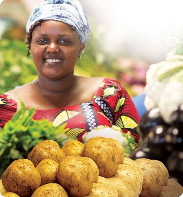 Smiling woman in a market